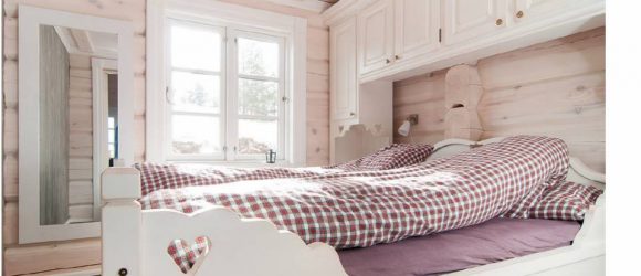 Bed with wardrobe around