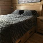 Double bed with night table
